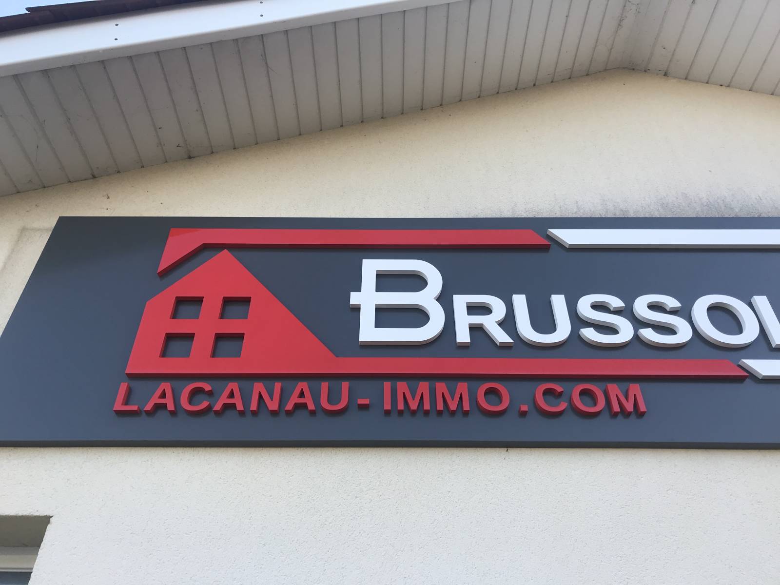 Création d'une enseigne pour agence immobilier à Lacanau