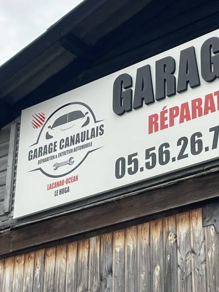 fabrication et pose d'une enseigne non-lumineuse pour un garage au Huga Lacanau